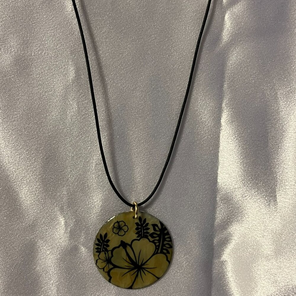 Genuine Abalone (Mother of Pearl) with Black Flower accents w/leather cord
